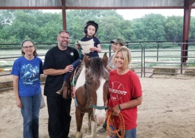Family with child on horse