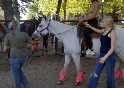 Girl riding Horse